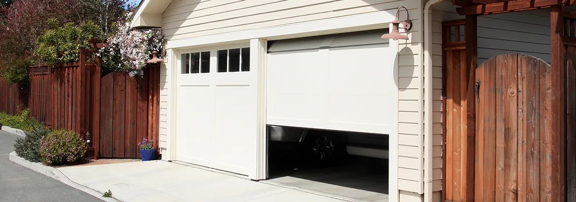 Fix Metal Garage Door Jerking in Freeport, Illinois